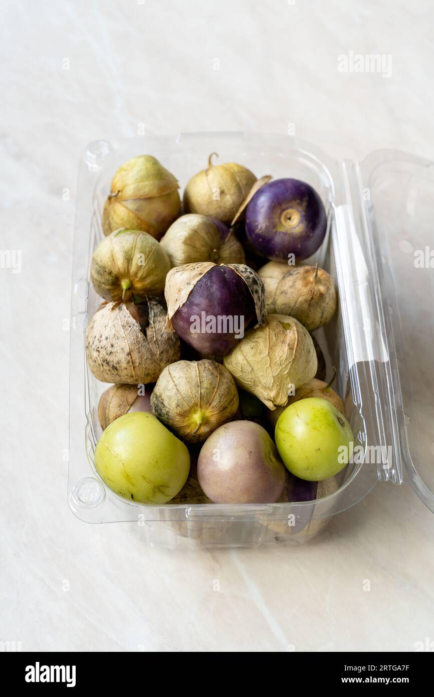 Tomatillos, green tomatoes, with salsa verde, green sauce, in a