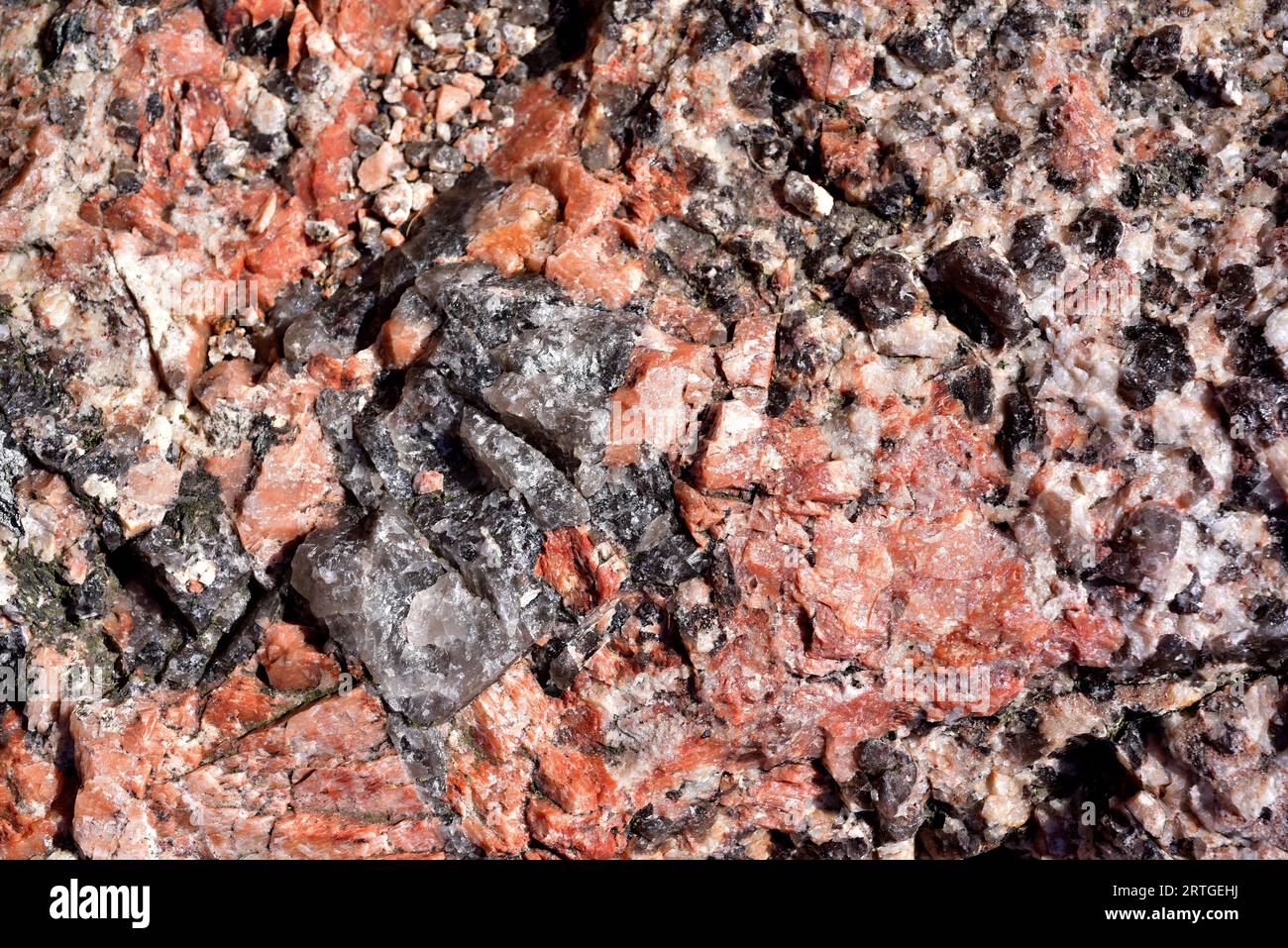 Porphyre granitic with large quartz and feldspar crystals. This photo was taken in Lysekil, Bohuslan, Sweden. Stock Photo