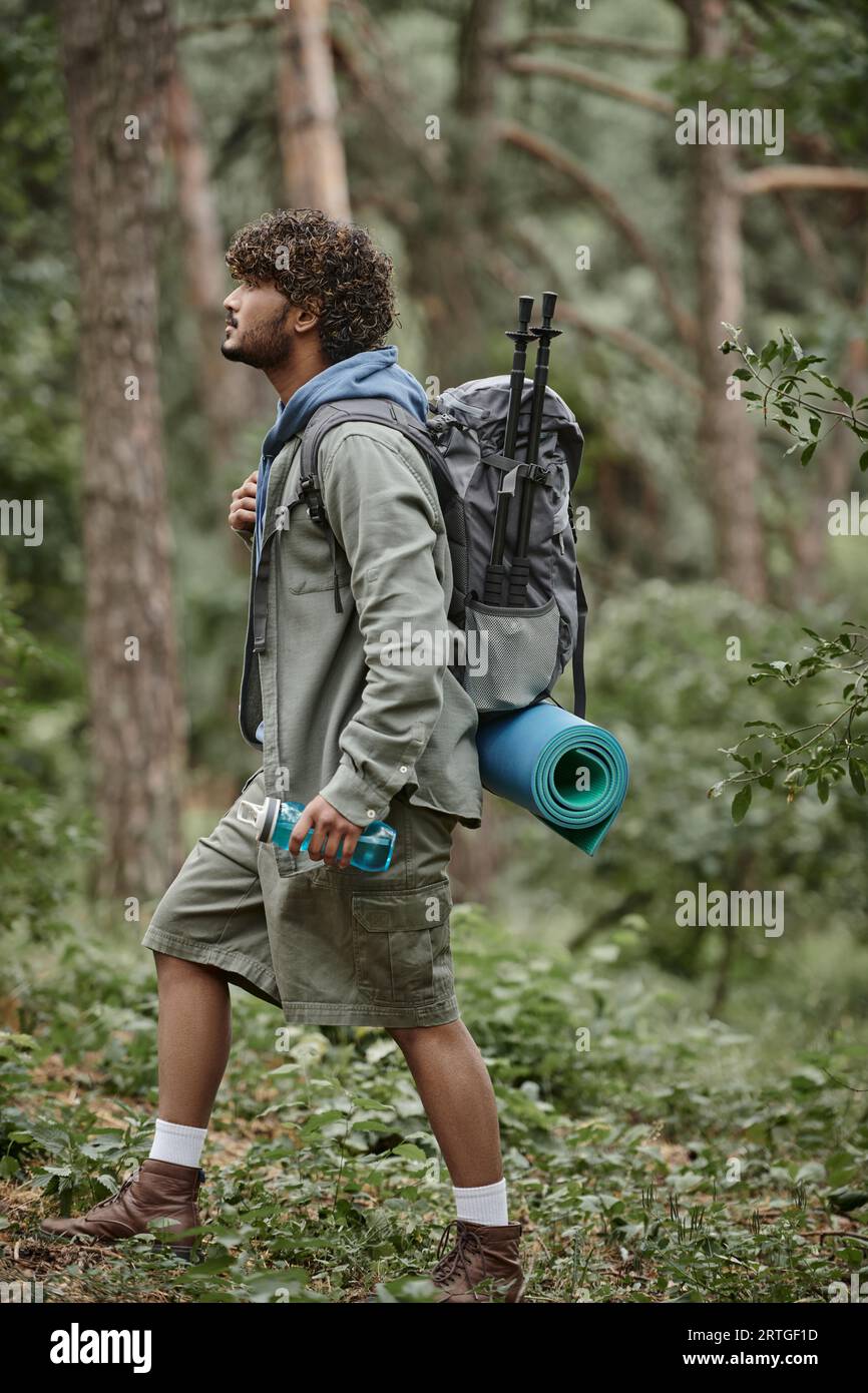 Indian man walking side view hi-res stock photography and images - Alamy