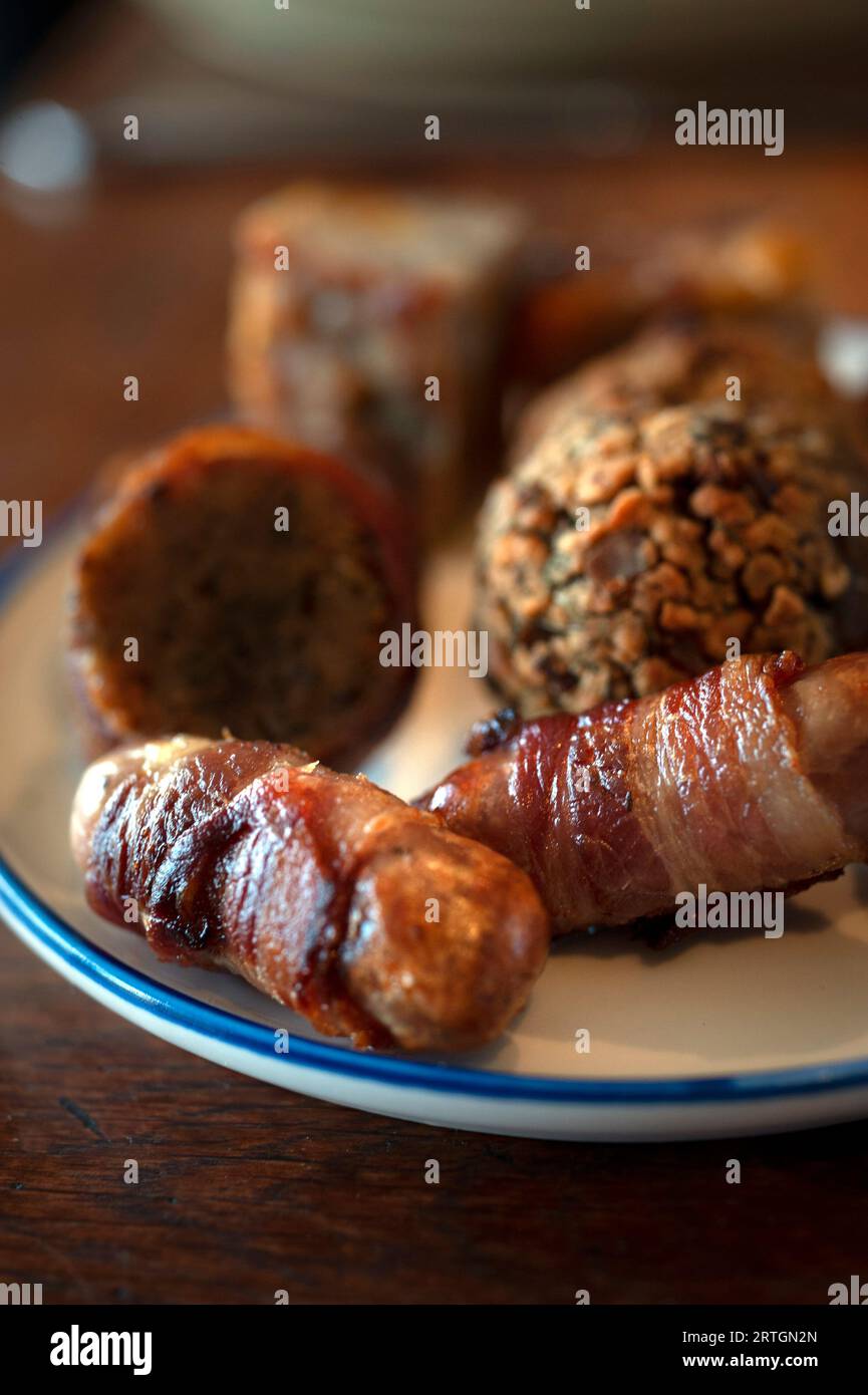 Pigs in blankets and stuffing balls Stock Photo