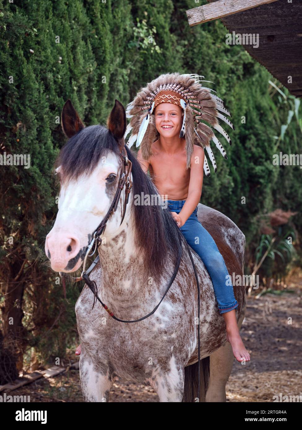 Indian boy on horse hi-res stock photography and images - Alamy