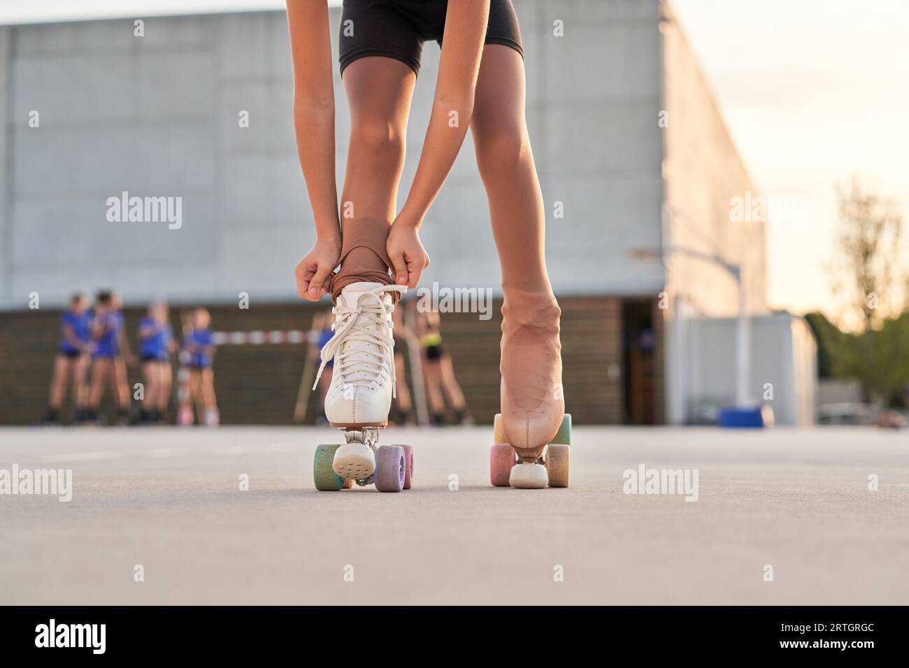 A Looker Leggy Long-haired Young Blonde Woman in a Vintage Roller Skates,  Sunglasses, T-shirt Shorts Sitting on Road. Eye-candy Yo Stock Photo -  Image of american, happy: 84896256