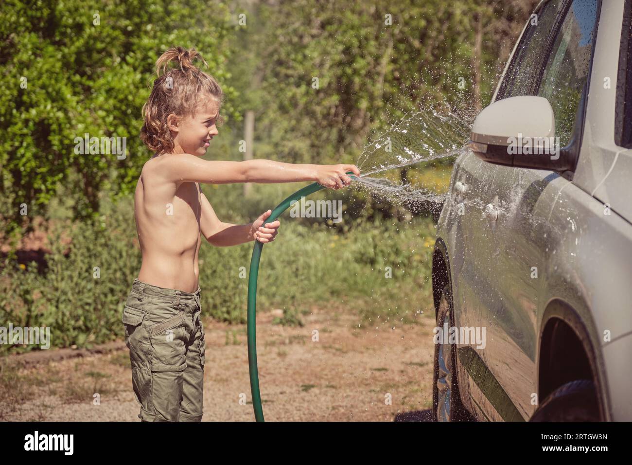 Washing car hose man hi-res stock photography and images - Alamy