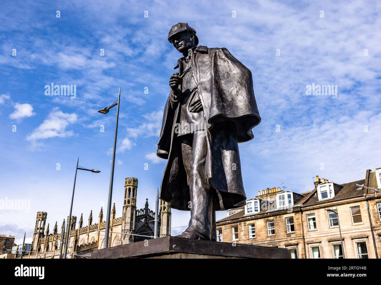Edinburgh, United Kingdom. 13 September, 2023 Pictured: Conan Doyle’s step-great granddaughter and designer of the Sherlock Holmes tartan, Tania Henzell welcomes back the statue of Sherlock Holmes, designed by Gerald Laing, to its new position on Edinburgh’s Picardy Place island.. Credit: Rich Dyson/Alamy Live News Stock Photo