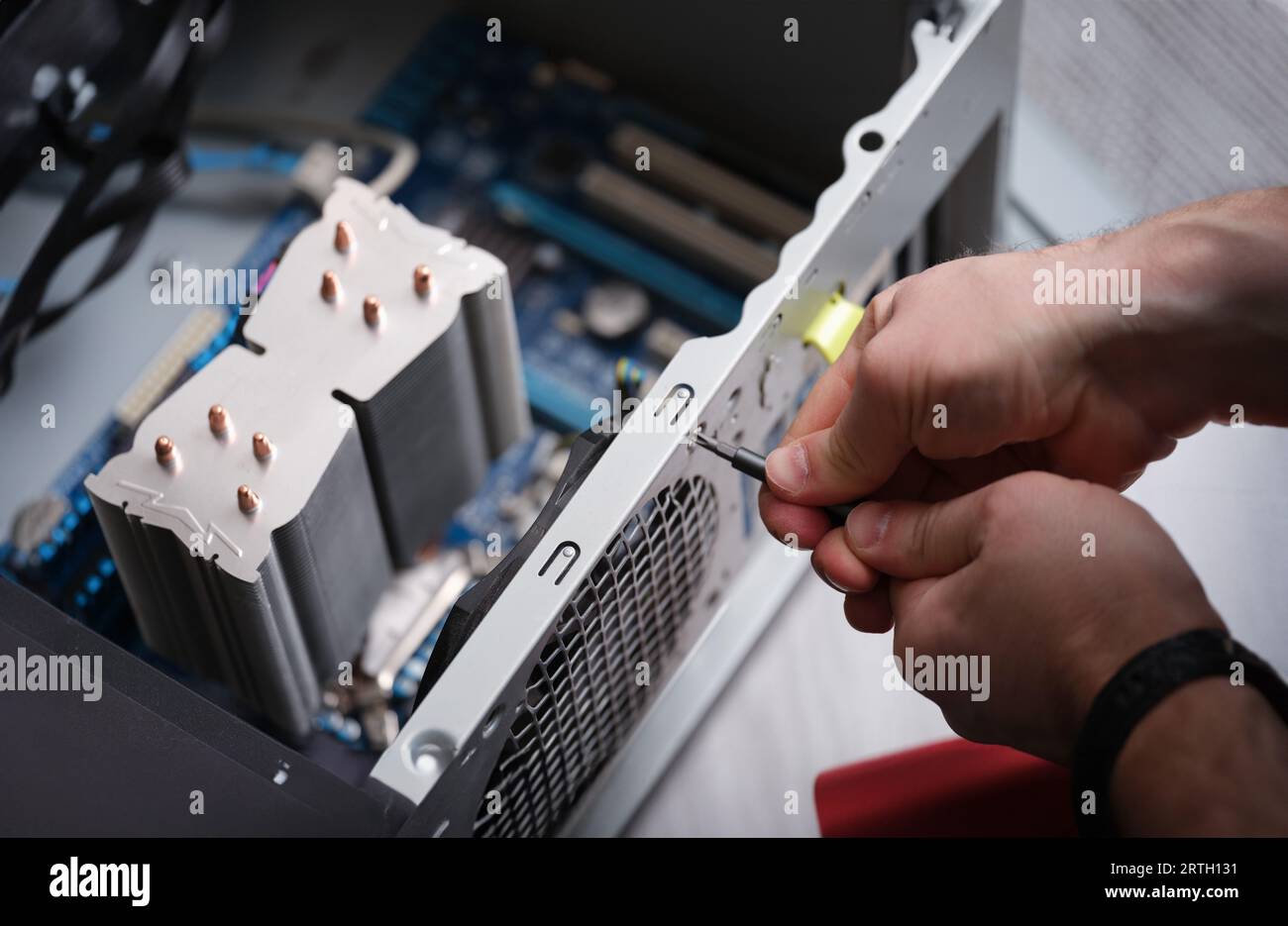 Technician repairing computer power supply closeup, Computer ...