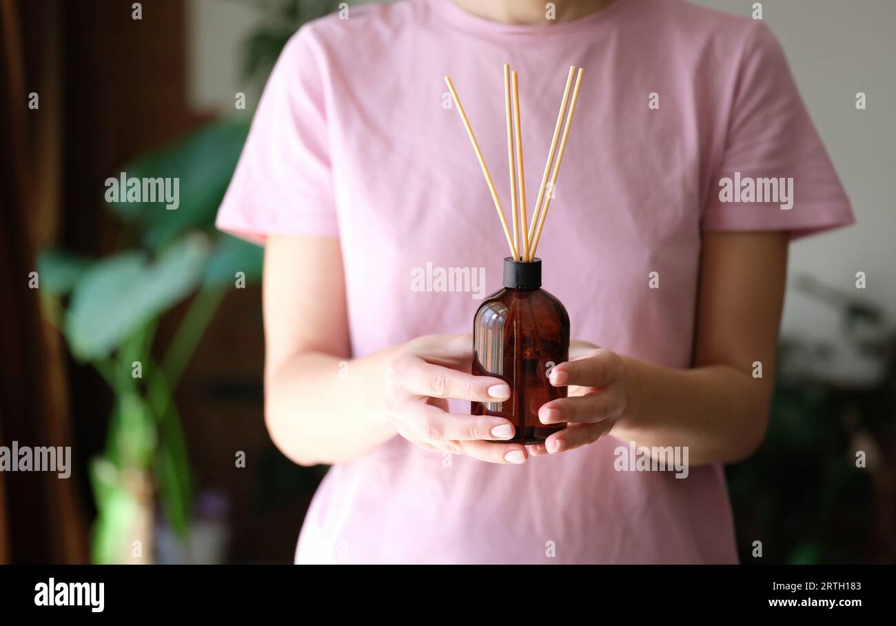 Woman hold incense home hi-res stock photography and images - Alamy