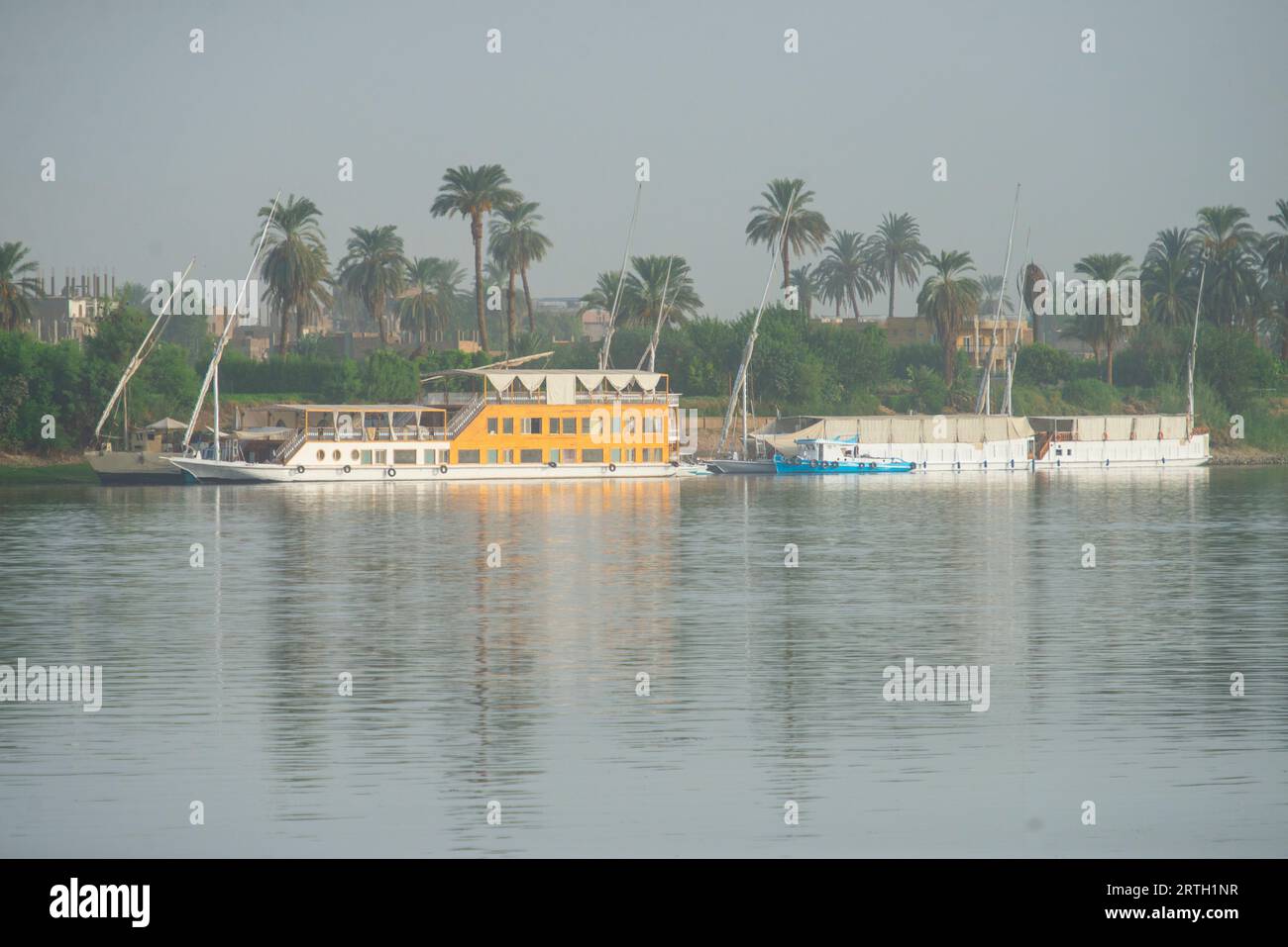 Large luxury traditional Egyptian dahabeya river cruise boats moored on ...