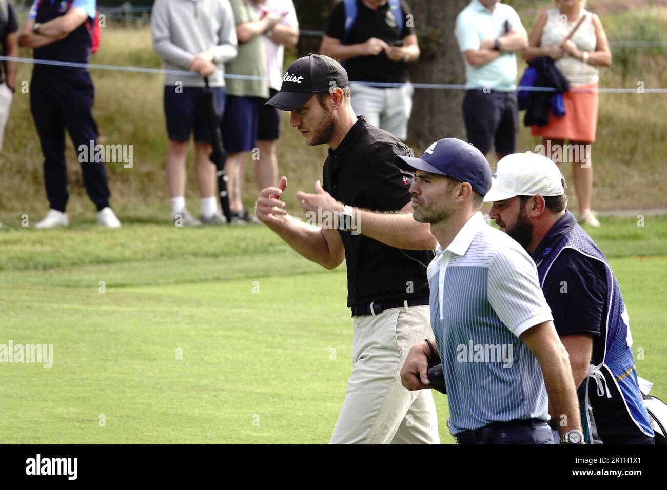 Wentworth, Surrey, UK. 13th Sep, 2023. Stuart Broad shows Jimmy Anderson how big his birdie was during the Pro-Am at the BMW:PGA golf Championship at The Wentworth Club. OPS: Credit: Motofoto/Alamy Live News Stock Photo