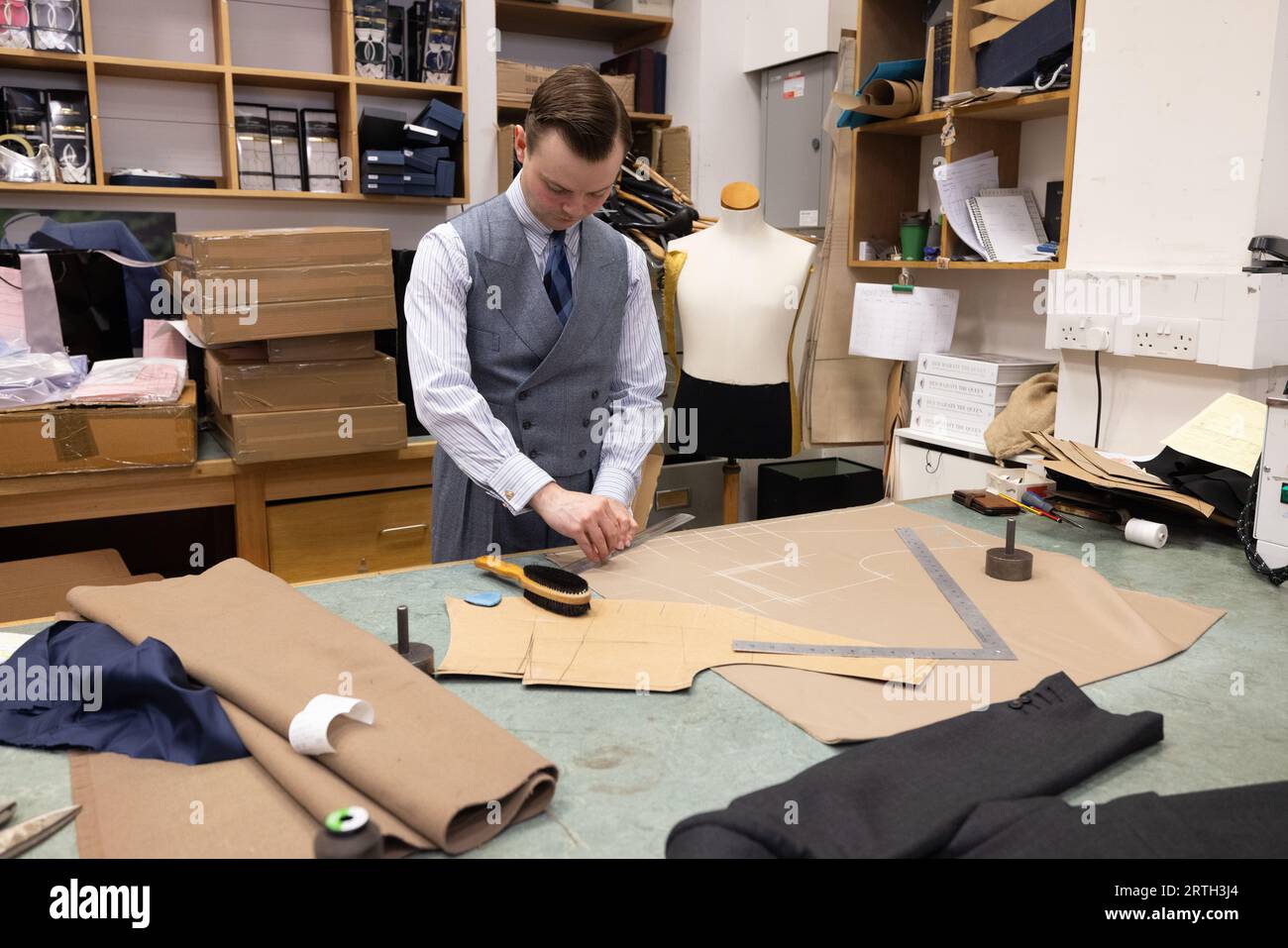 Master Cutter working at Dege & Skinner, familyowned tailoring house