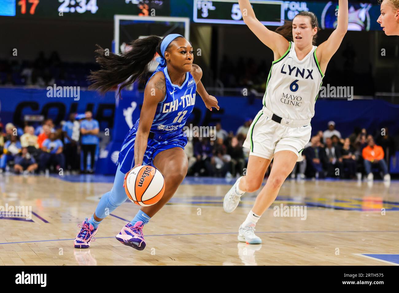 Dana Evans of the Chicago Sky dribbles towards the basket in Chicago, IL at Wintrust Arena. Stock Photo