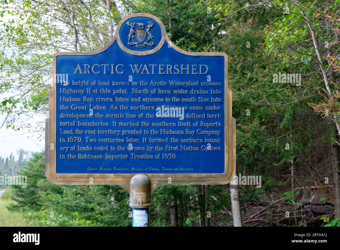 Sign on highway 11 in Ontario Canada with information on the Atlantic and Artic Watershed.  From this point south, all streams feed into the Great Lak Stock Photo