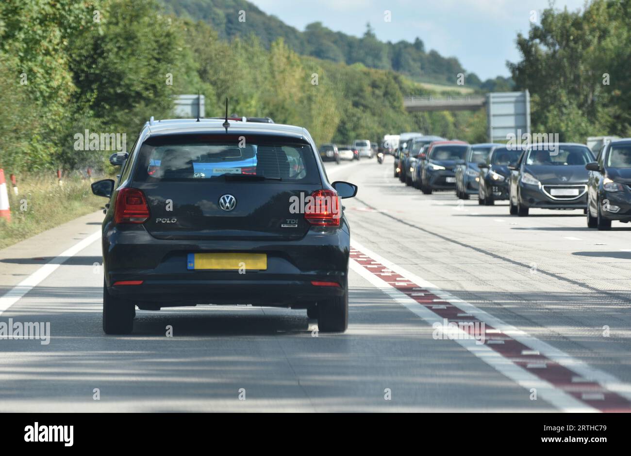 Queues of slow moving traffic on both carriageways of the A303 road near  Yeovil in Somerset in the United Kingdom Stock Photo