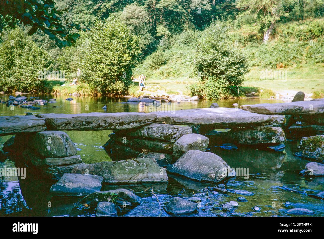 Tarr Steps clapper bridge, River Barle, Somerset, England, UK autumn 1968 Stock Photo