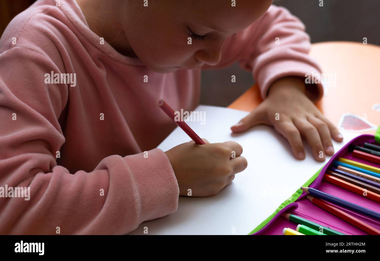 Cute little preschooler child drawing at home Stock Photo - Alamy