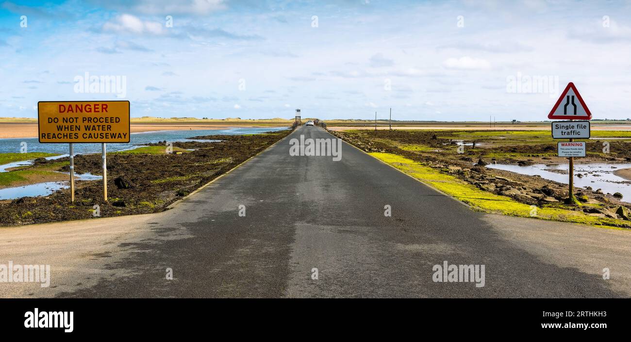 Beal Causeway for crossing to Holy Island when the tide is out, Northumberland, England, UK Stock Photo
