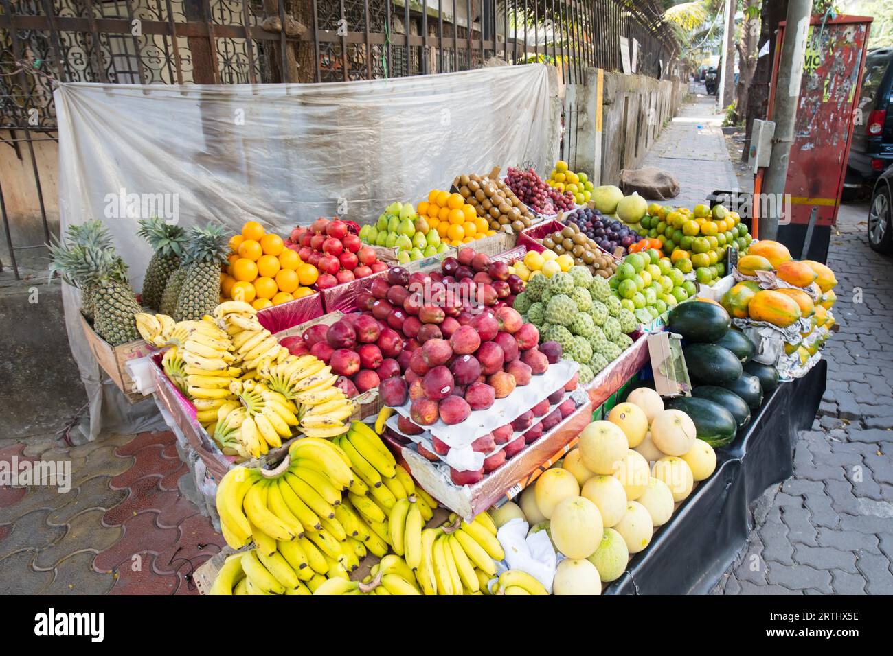 A Mumbai food stall with many fruits and vegetables Stock Photo Alamy
