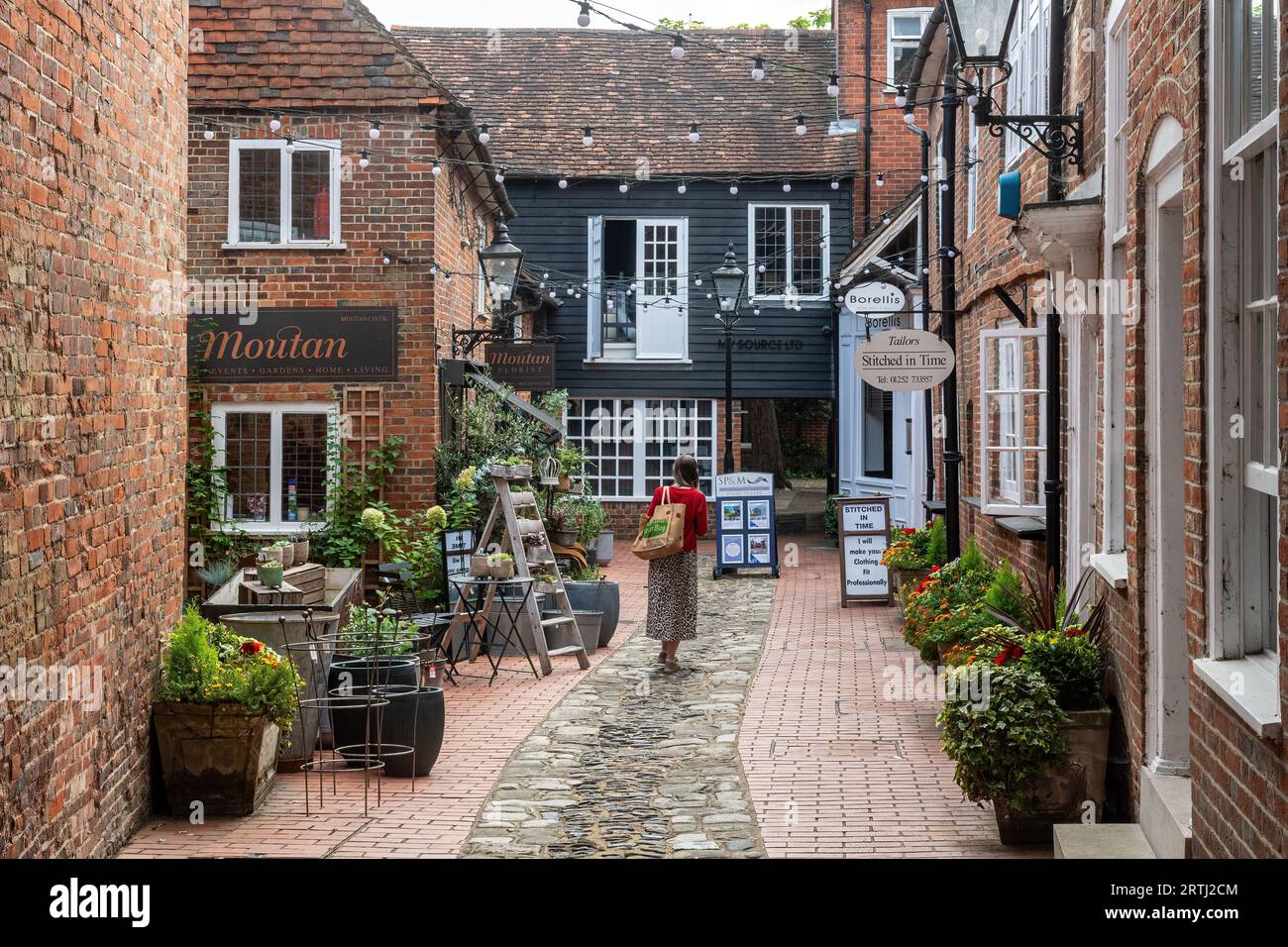 Borelli Yard, on of the historic yards in Farnham town centre, Surrey, England, UK, with shops