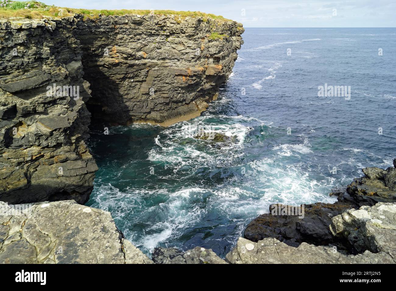 The Kilkee Cliff walk is a scenic 2 to 3 hour (8km) moderate loop walk along the Kilkee Cliffs starting at the Diamond Rocks Cafe, Pollock Holes car Stock Photo