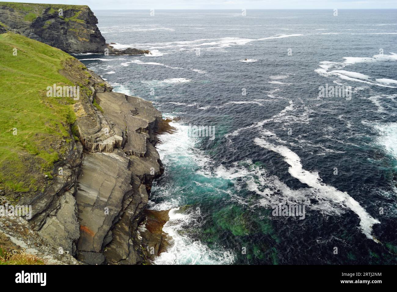 The Kilkee Cliff walk is a scenic 2 to 3 hour (8km) moderate loop walk along the Kilkee Cliffs starting at the Diamond Rocks Cafe, Pollock Holes car Stock Photo