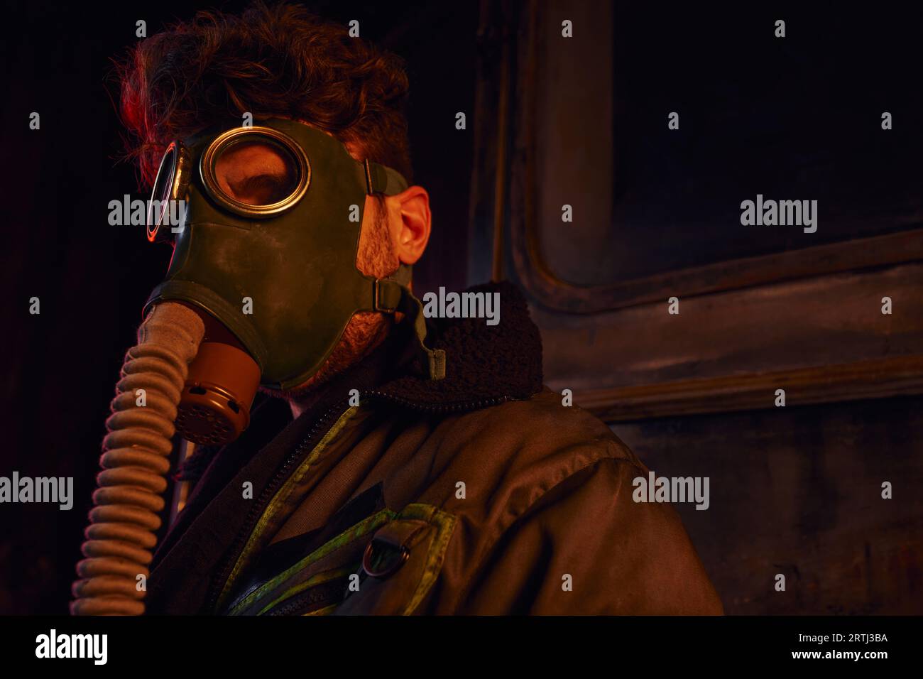 nuclear catastrophe survivor wearing  gas mask in abandoned subway, post-apocalyptic, game character Stock Photo