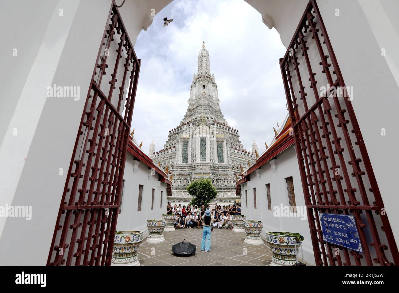 Bangkok, Thailand. 16th June, 2023. Tourists take photos at the Wat Arun in Bangkok, Thailand, June 16, 2023. Thailand has approved a temporary visa waiver for visitors from China and Kazakhstan during the year-end high season in support of its vital tourism industry. Credit: Wang Teng/Xinhua/Alamy Live News Stock Photo