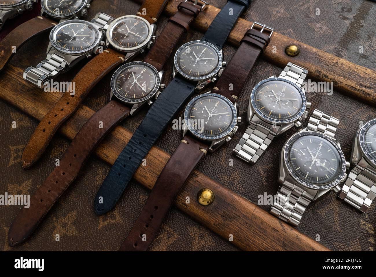 Vintage Omega Speedmaster shoot on top of an old riveted Louis