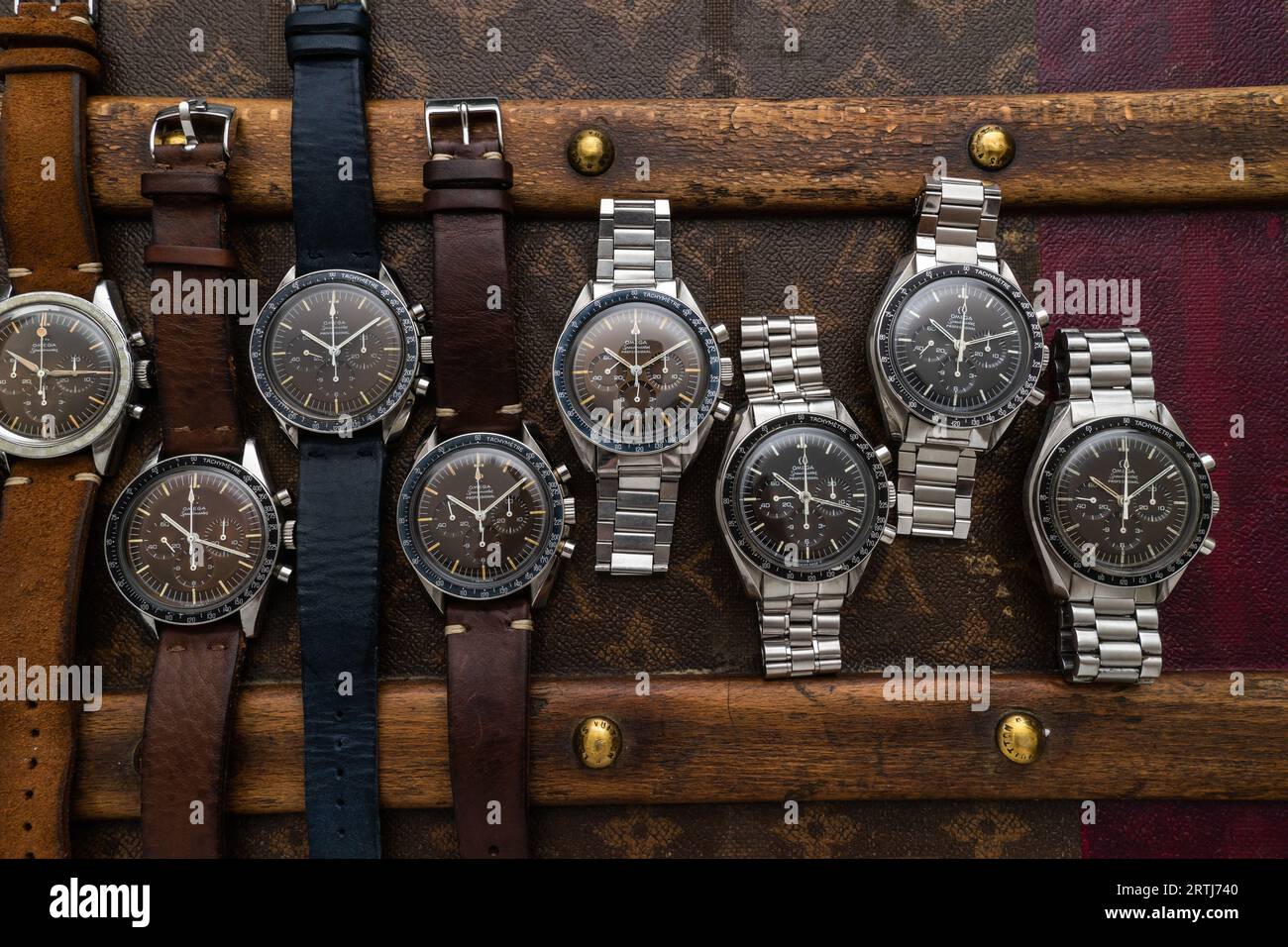 Vintage Omega Speedmaster shoot on top of an old riveted Louis Vuitton  travel case with it's iconic LV pattern Stock Photo - Alamy