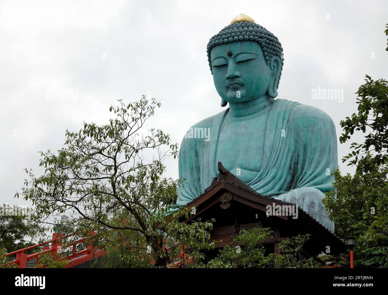 A majestic Buddha statue stands proudly in Wat Doi Phra Chan, a