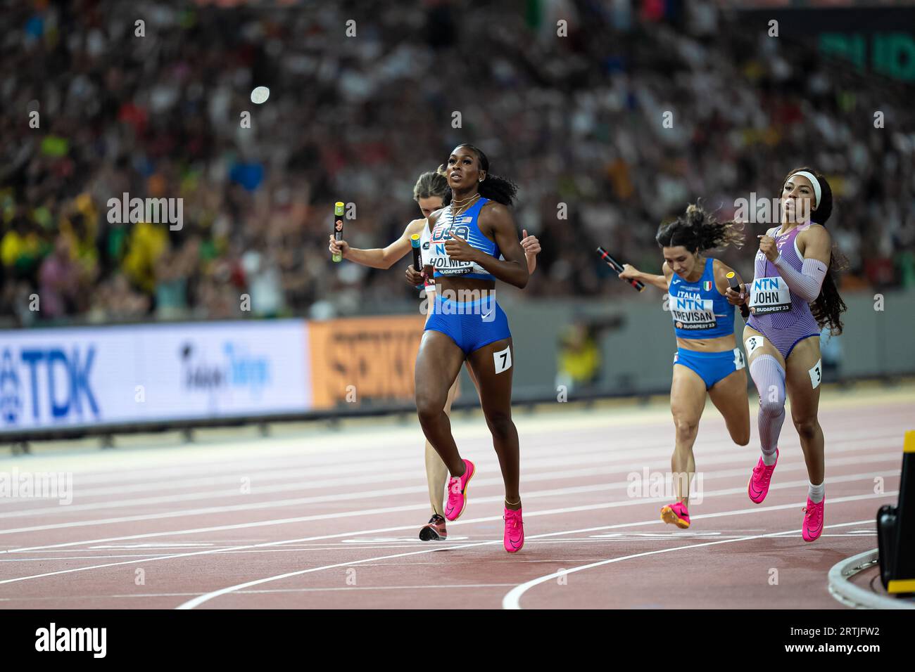 Alexis Holmes participating in the 4X400 meters relay at the World ...