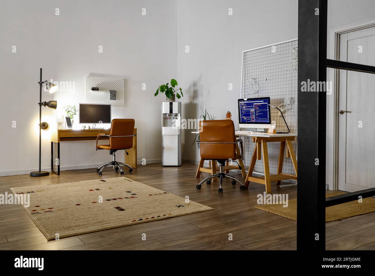 Interior of modern office with programmer's workplaces Stock Photo - Alamy