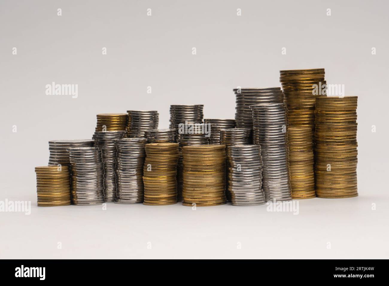 Pile of coins isolated on a white background. Banking and money. Stock Photo