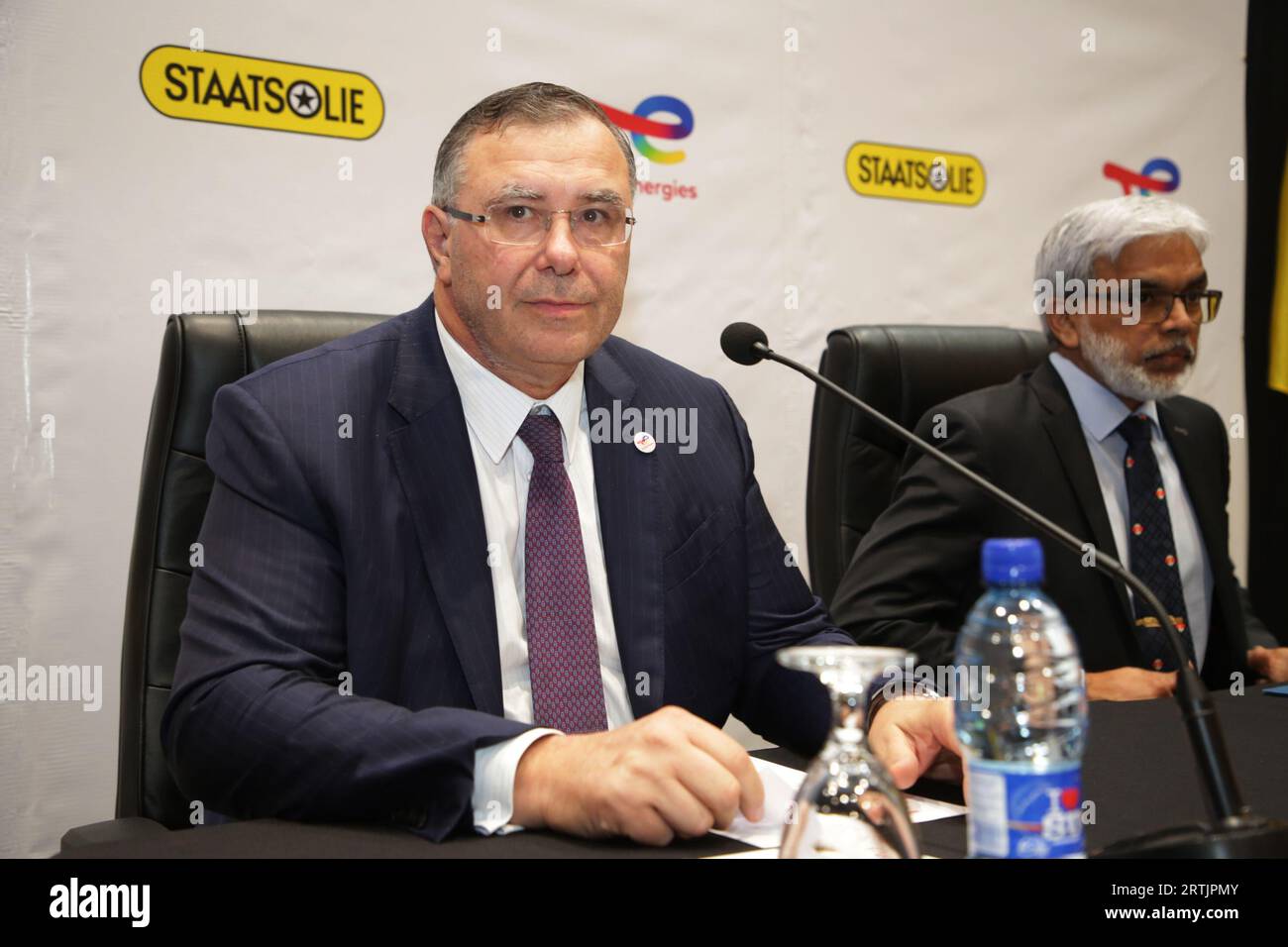 French oil giant TotalEnergies CEO Patrick Pouyanne and General Manager Annand Jagesar of Staatsolie Maatschappij Suriname nv during a joint press briefing at Royal Torarica on Wednesday, September 13, 2023 in Paramaribo, Suriname. TotalEnergies and partner APA Corporation will… and indicate their Final Investment decision before the end of 2024, with oil production targeted in 2027. ANP RANU ABHELAKH netherlands out - belgium out Stock Photo