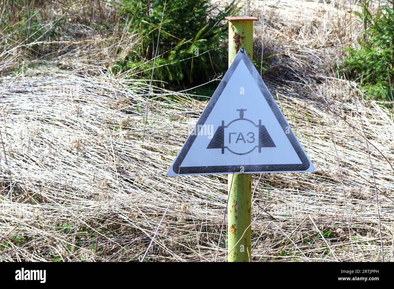 Gas underground. Gas piping location marker. Gas pipes in the ground