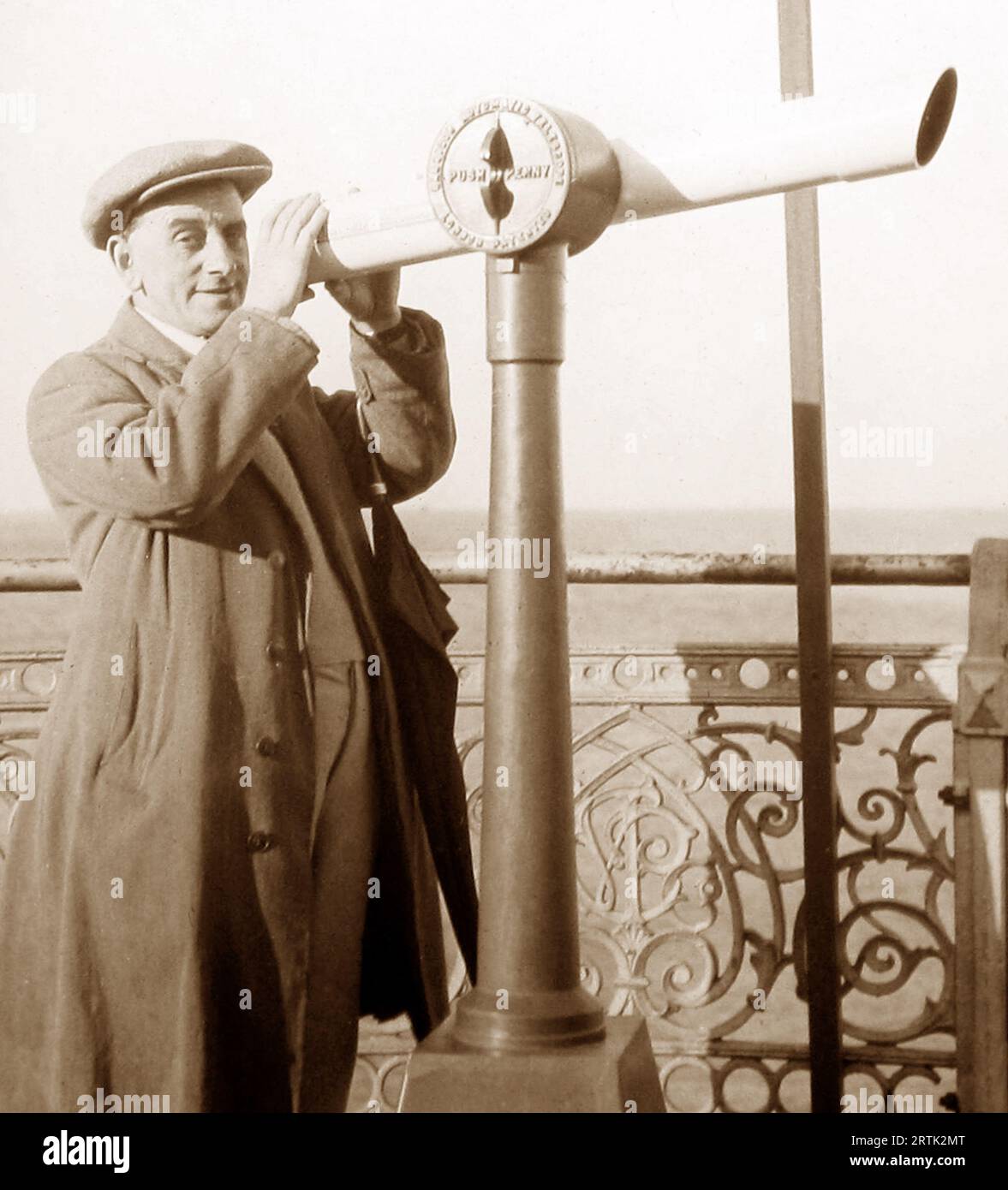 A 'push penny' autotelescope at the seaside, probably 1920s Stock