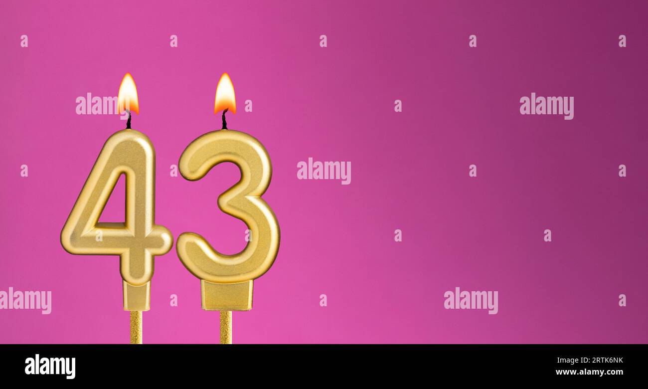 Candle number 43 in purple background - birthday card Stock Photo - Alamy