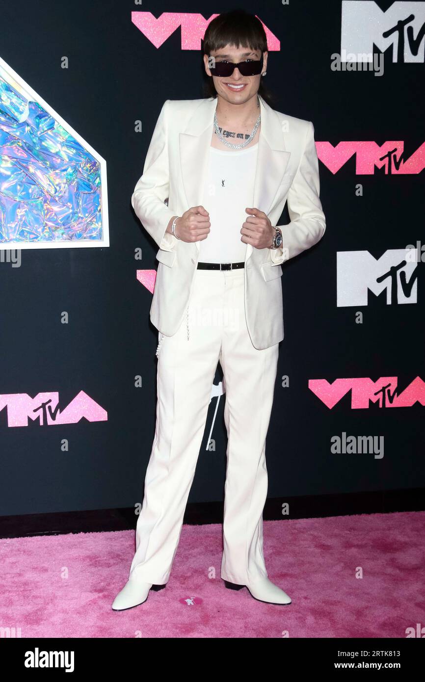 Peso Pluma arrives on the pink carpet of the 2023 MTV Video Music