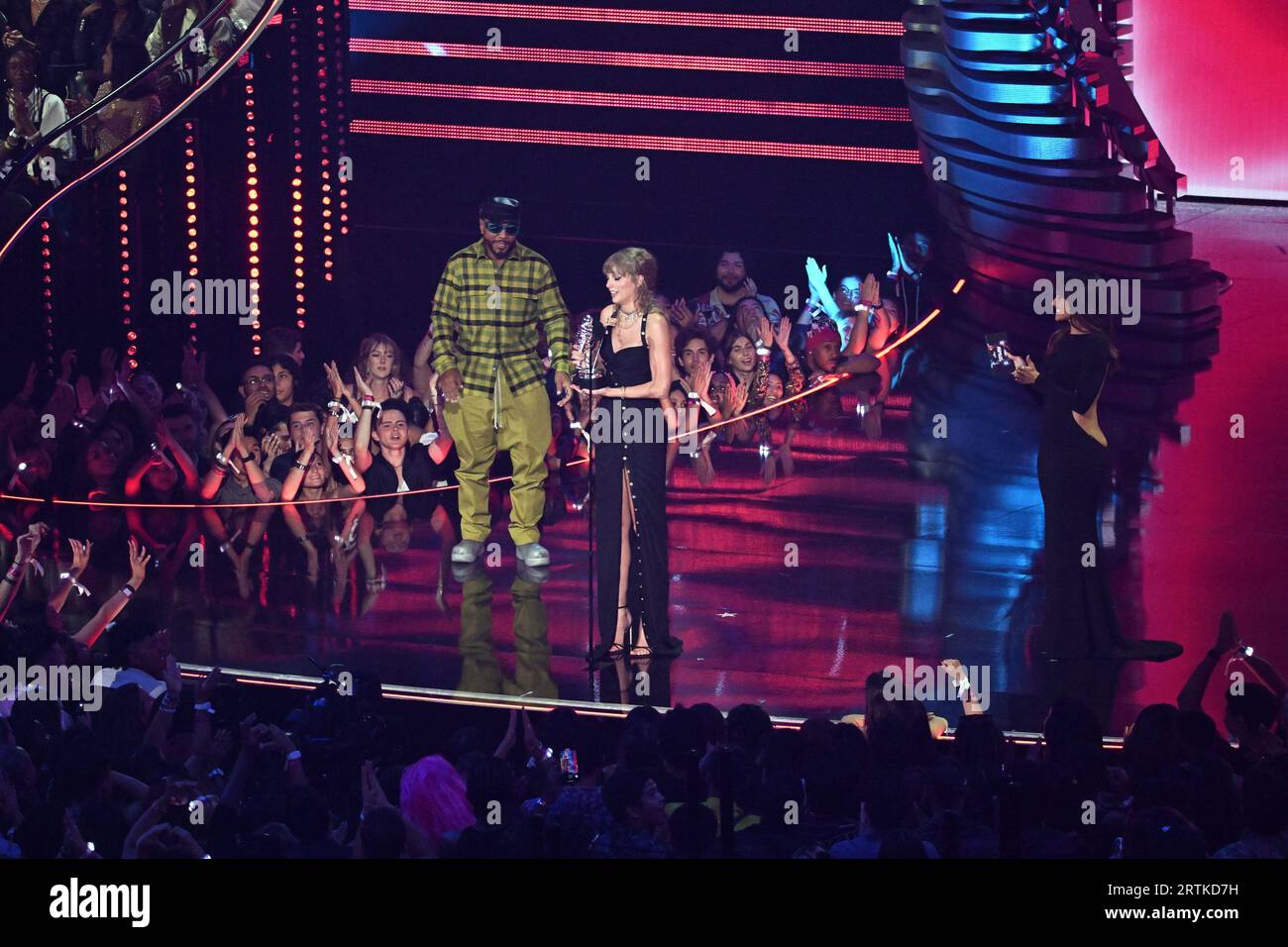Newark, USA. 12th Sep, 2023. Taylor Swift accepts the Song of the Year award for 'Anti-Hero' from Timbaland and Nelly Furtado onstage during the 2023 MTV Video Music Awards at Prudential Center on September 12, 2023 in Newark, New Jersey. Photo: Jeremy Smith/imageSPACE Credit: Imagespace/Alamy Live News Stock Photo