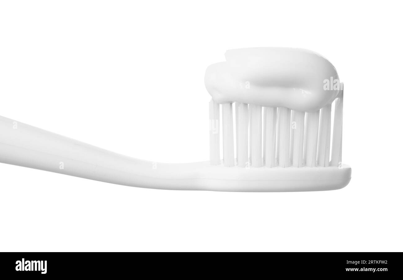 Plastic toothbrush with paste on white background, closeup Stock Photo