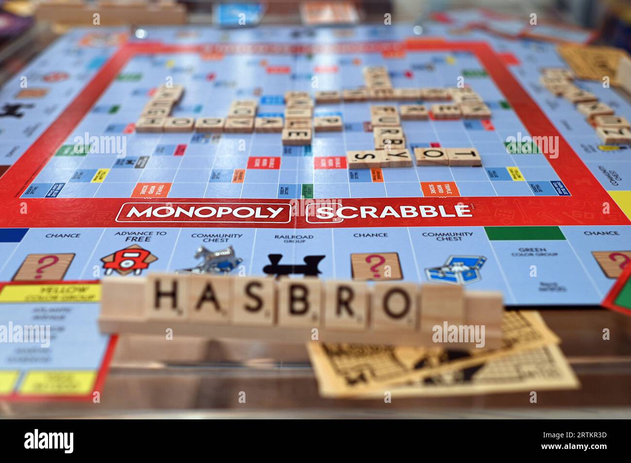 New York, USA. 13th Sep, 2023. Hasbro displays their ‘Monopoly-Scrabble' board game at the TTPM (Toy, Tots, Pets & More) holiday exhibition held at the Metropolitan Pavilion, New York, NY, September 13, 2023. The sum of the letters created on the Scrabble side determines the number of spaces you move on the Monopoly side; the exhibition displays toys for interactive play from both large and smaller toy manufactures. (Photo by Anthony Behar/Sipa USA) Credit: Sipa USA/Alamy Live News Stock Photo