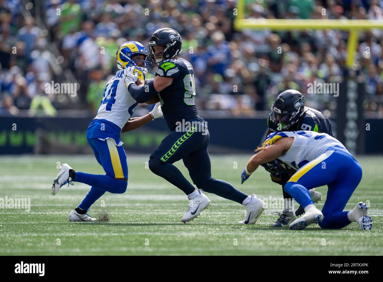 Los Angeles Rams defensive back Ahkello Witherspoon (44) battles Seattle  Seahawks tight end Will Dissly (89)