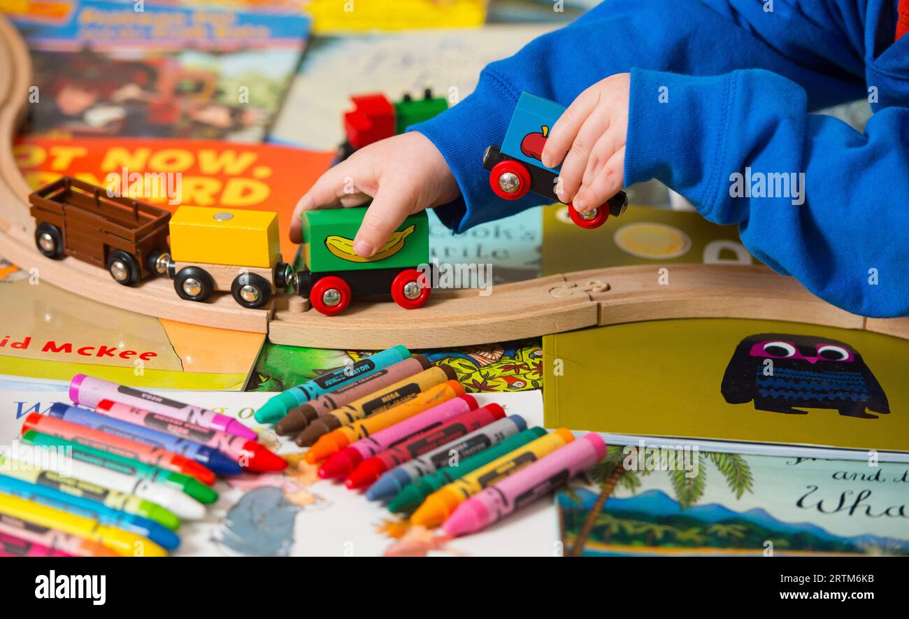 File photo dated 24/01/15 of a toddler playing with a selection of children's toys. Children in Reception who took part in a Covid catch-up programme made four additional months' progress in their language development compared to pupils who did not participate, a study suggests. The Nuffield Early Language Intervention (Neli) was offered to all state primary schools in England across three academic years to help four - and five-year-olds affected by the pandemic with their language skills. The national rollout of the scheme, funded by the Department for Education (DfE) as part of its efforts t Stock Photo