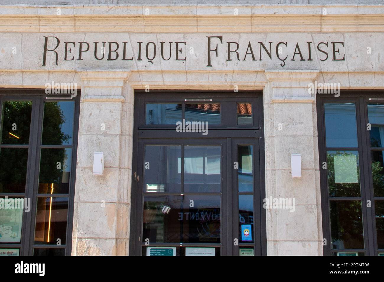 Saint emilion , France -  08 28 2023 : republique francaise text sign in building city hall facade means  French Republic town hall the house mayor in Stock Photo