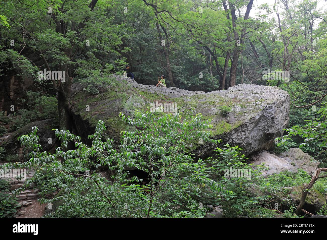 Beijing, China - June 26, 2021: tourists on giant rocks at the Beijing ...