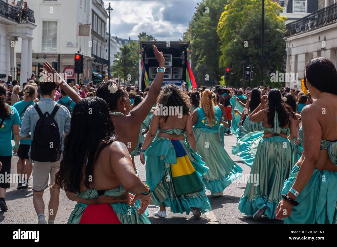 NOTTING HILL, LONDON, ENGLAND - 28 August 2023: Performers wearing costumes at Notting Hill Carnival 2023 Stock Photo