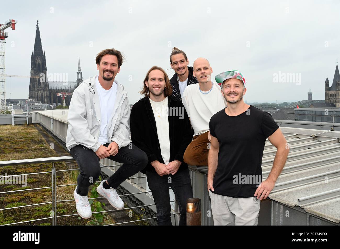 Cologne, Germany. 13th Sep, 2023. Oliver Niesen, Kevin Wittwer, Dominik Schönenborn, Hannes Feder and Yannick Richter from the Cologne band 'Cat Ballou'. It celebrates its 25th stage anniversary in 2024, including a concert in the Lanxess Arena on 04.10.2024. Credit: Horst Galuschka/dpa/Alamy Live News Stock Photo