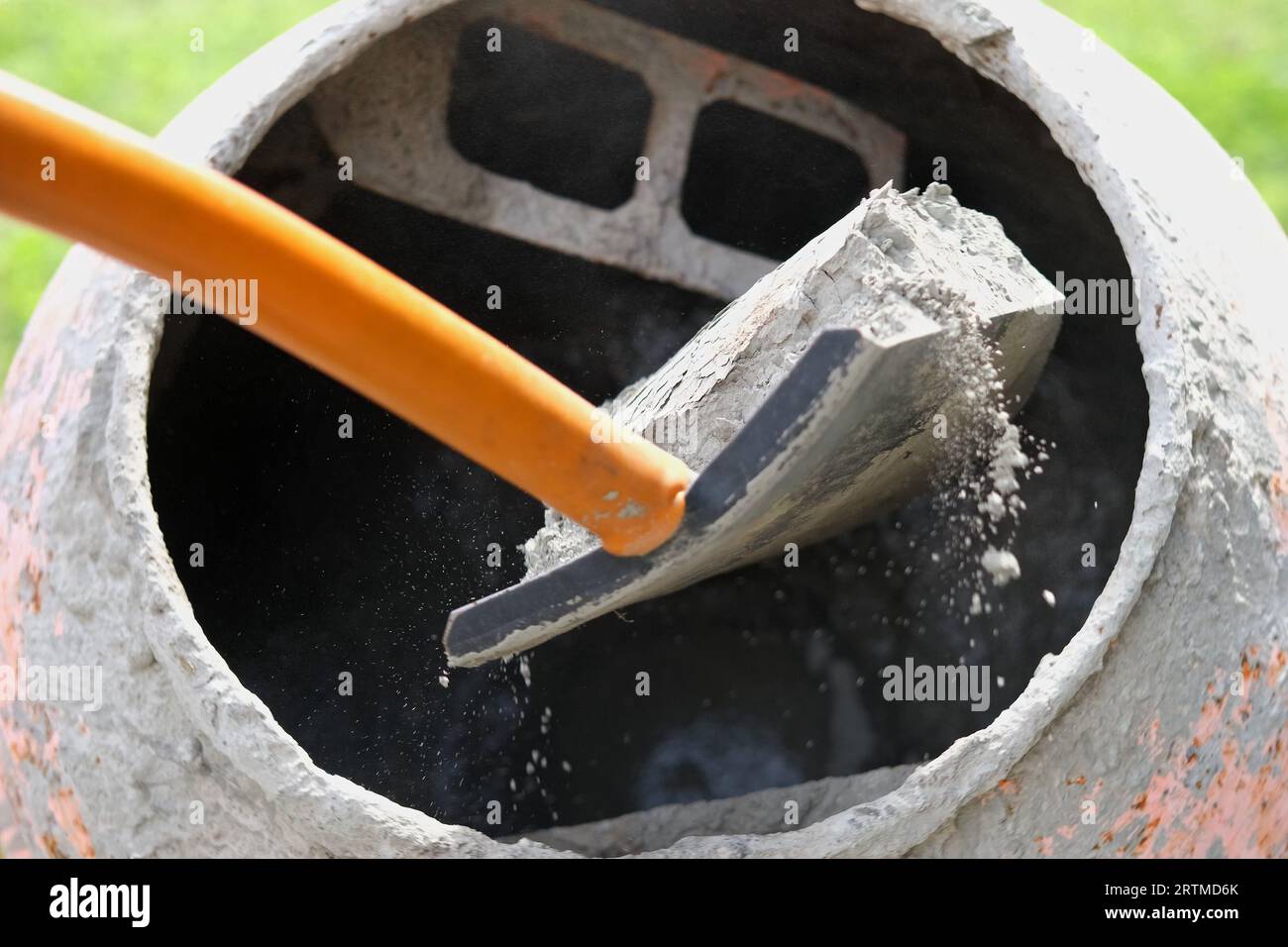 Bucket cement mix with on construction site the ingredients. Brick, Stone,  Mortar, Sand Stock Photo - Alamy