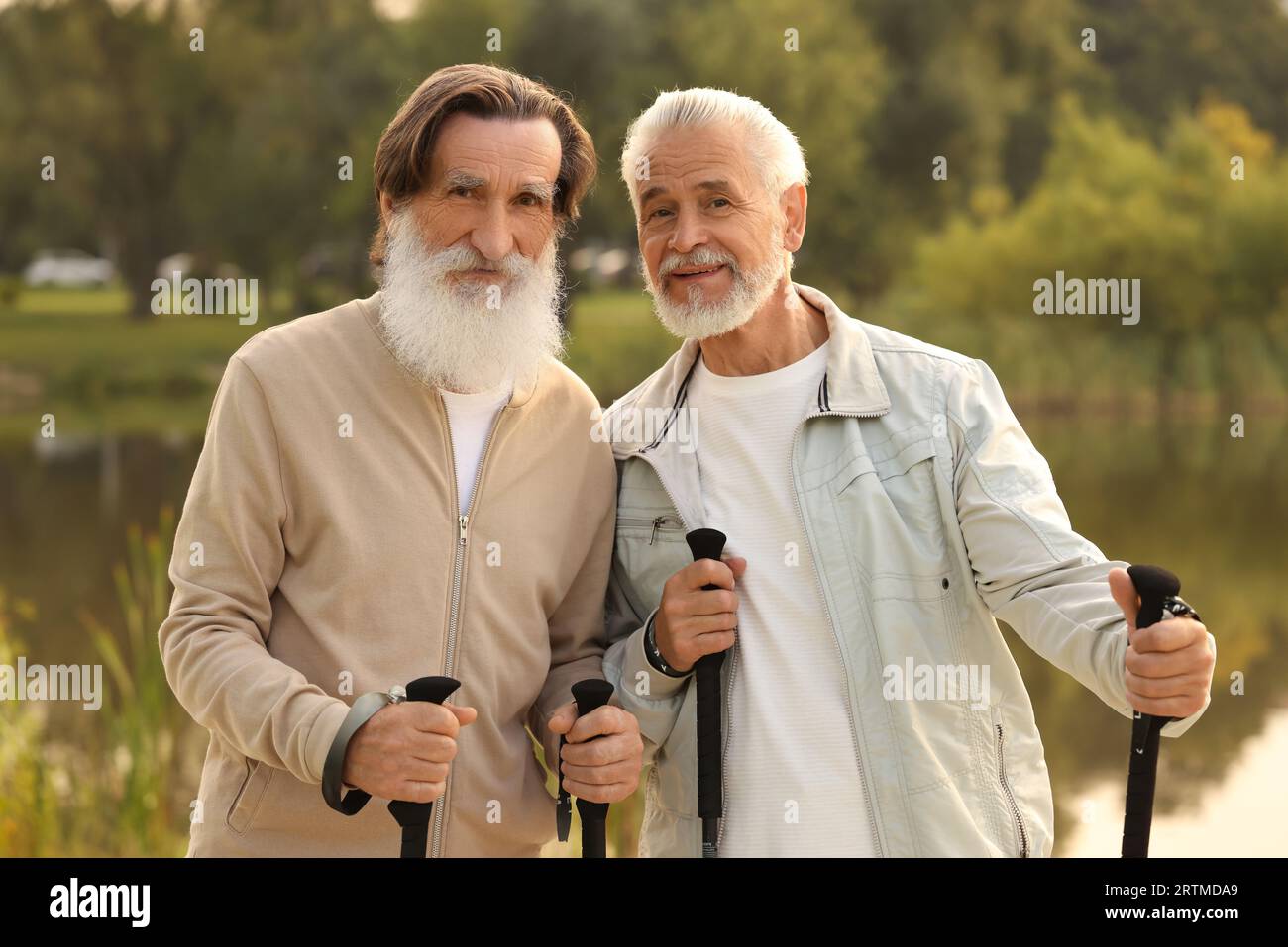 Two senior men with walking sticks hi-res stock photography and images ...
