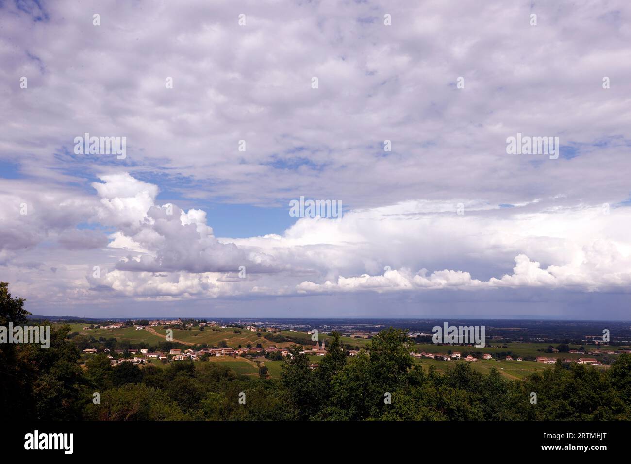 Burgundy landscape with cloudy sky Stock Photo - Alamy