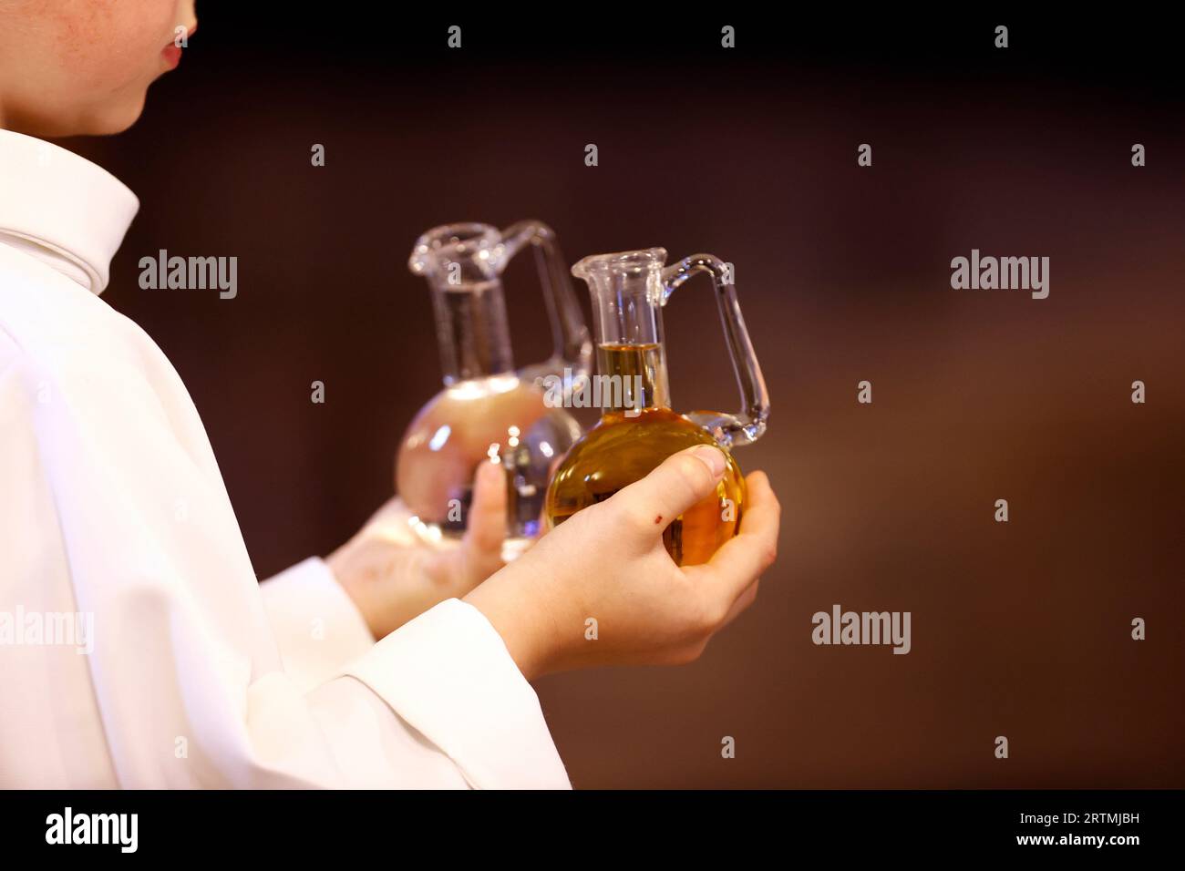 Saint Nicolas church. Catholic mass. Eucharist celebration. Pair of