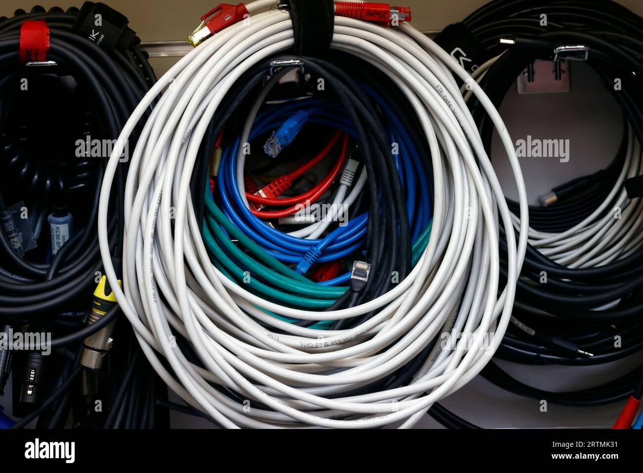 Abstract communication cables background. Wires and connectors for computer audio video.   Saint-Gervais Mont-Blanc. France. Stock Photo